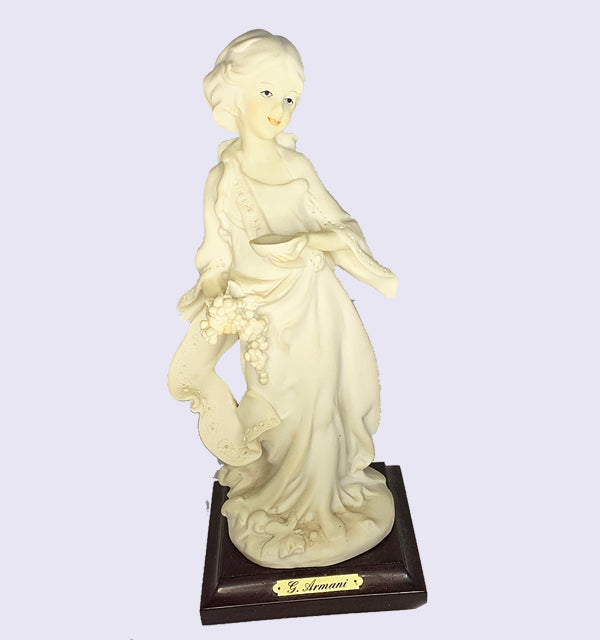 G. Armani - Lady with Grapes